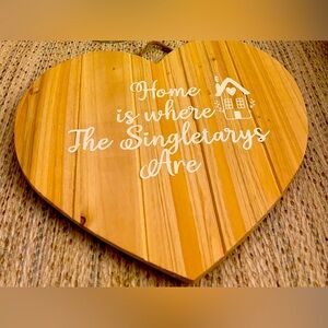 Heart shaped wooden family home sign